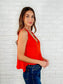 V-Neck Ruffled Peplum in Spicy Orange